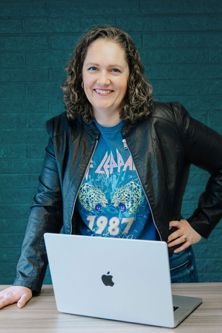 Headshot photo of website designer and developer, Shannon Gross.