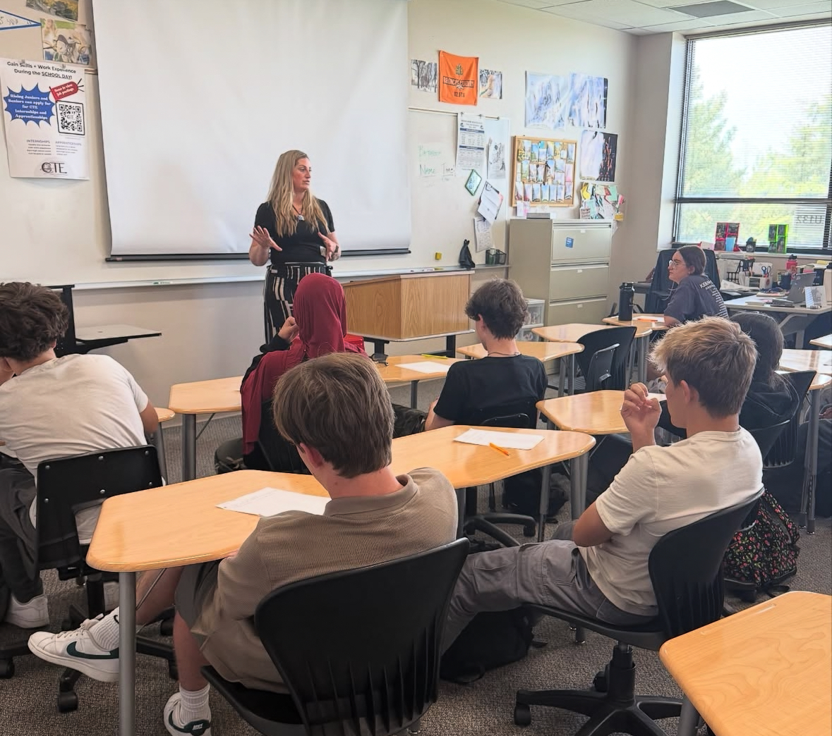 Anne Gillaspie of Fix and Form Strategic Branding Agency, speaking to a classroom on what it means to inspire women in business