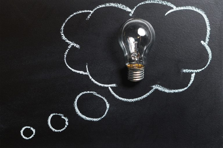 A lightbulb inside a chalk-drawn thought bubble symbolizing creative strategy and the bright ideas behind every Fix & Form branding project.